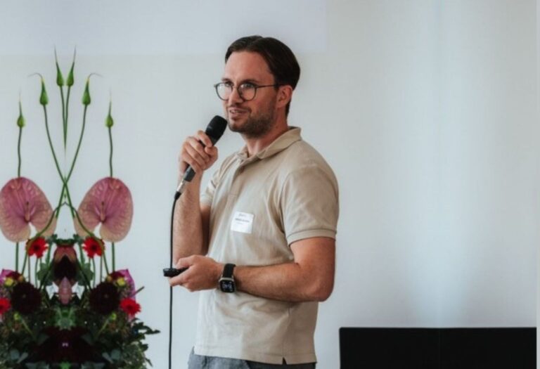 Sebastian Amann von AiAuditBuddy am Mikro
